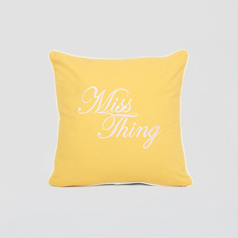 Funda de cojín azul "Miss Thing"